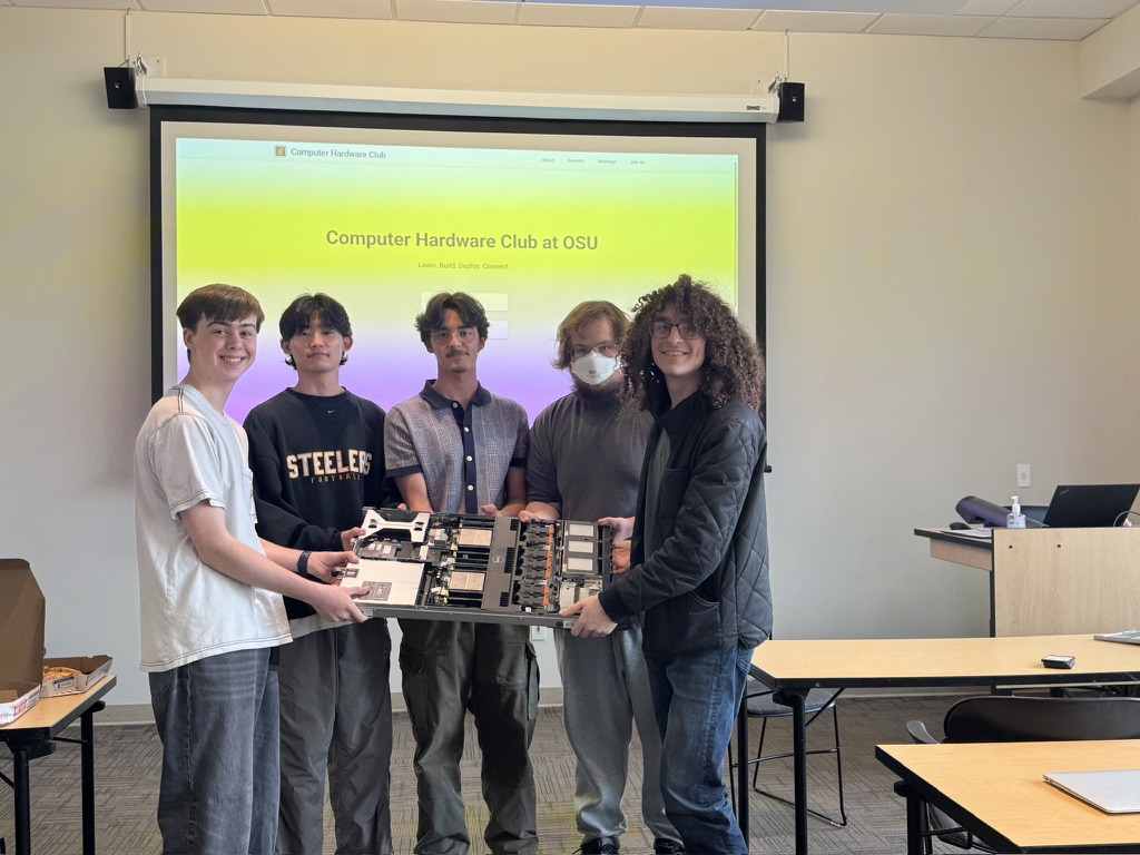 Club members holding Peter